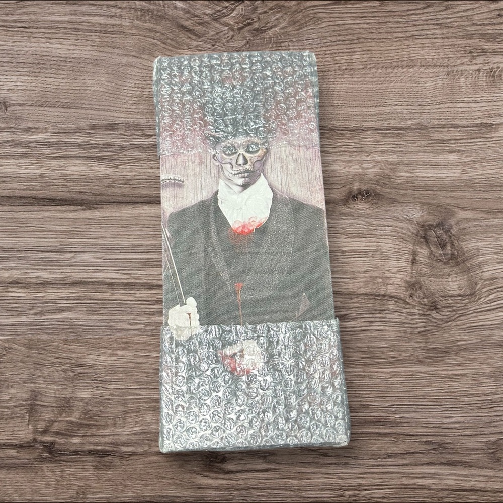 Elegant Skeleton Wallâ Art in Black and Red
